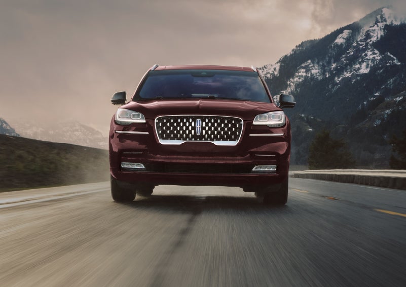 A 2024 Lincoln Aviator® SUV is shown in the Diamond Red exterior color. | Lincoln Demo 5 in Derwood MD