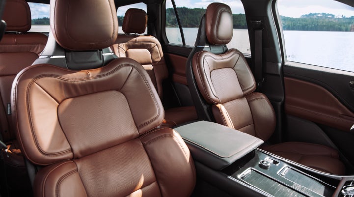 The front row's Perfect Position Seats in a 2024 Lincoln Aviator® Reserve model with Ebony Roast interior | Lincoln Demo 5 in Derwood MD