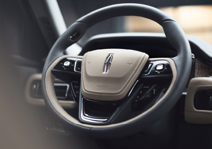 The intuitively placed controls of the steering wheel on a 2024 Lincoln Aviator® SUV | Lincoln Demo 5 in Derwood MD